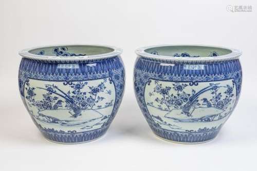 A large pair of Chinese blue and white planters in Ming styl...