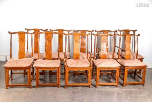 A collection of ten Chinese hardwood yoke-back dining chairs