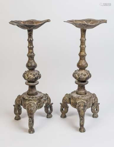 A pair of Chinese bronze and gilt inlaid Bricket candlestick...