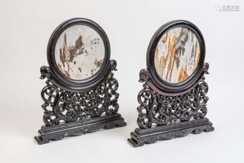 A pair of Chinese hardstone circular table screens, 24 in. (...