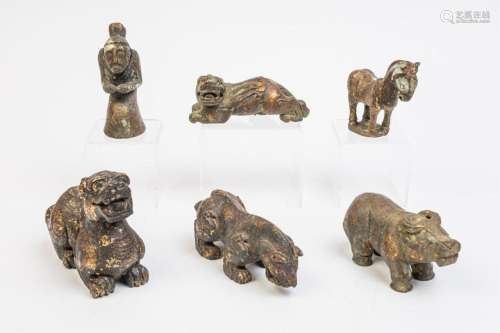 Six Chinese hardstone and gilt figures of animals and an old...