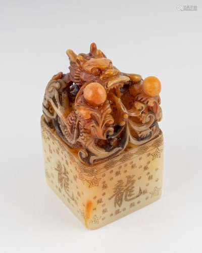 A Chinese carved dragon seal stone with rectangular base. 3 ...