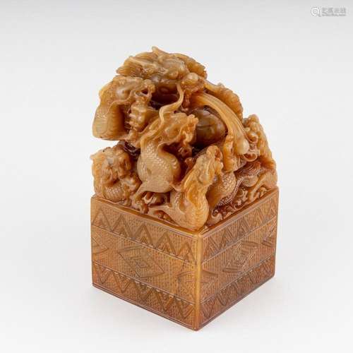 A Chinese Imperial style carved honey brown seal of large si...