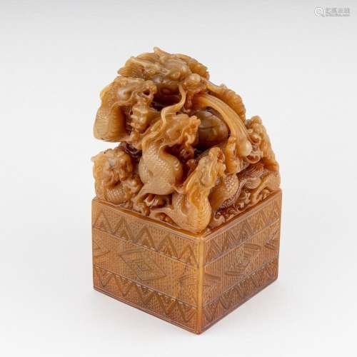 A Chinese Imperial style carved honey brown seal of large si...