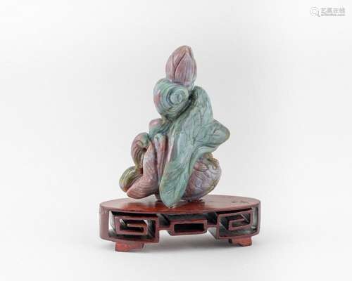 A Chinese carved jadeite carp and lotus, 5 1/8 in. (13.02 cm...