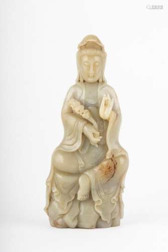 A Chinese jadeite figure of Guanyin, 11 3/4 in. (29.85 cm.)