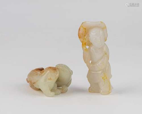 A Chinese white and russet jadeite figure, 3 1/4 in. (8 cm)
