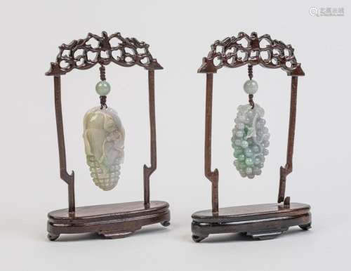 Two jadeite pendants in the form of fruit,
