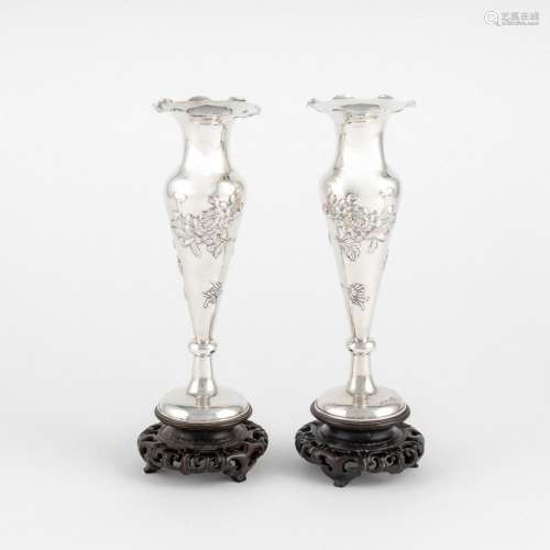 A pair of Chinese silver vases