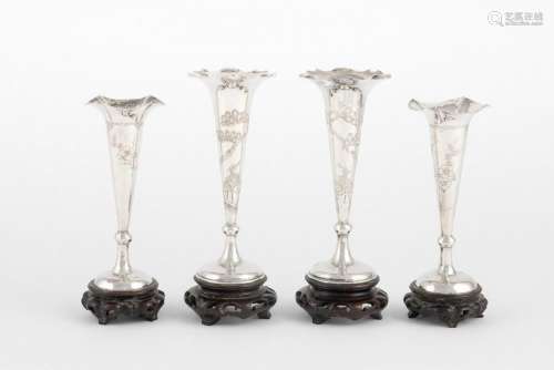 A collection of four Chinese silver vases