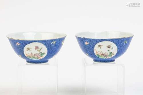 A pair of famille rose sgraffito blue ground medallion bowls...