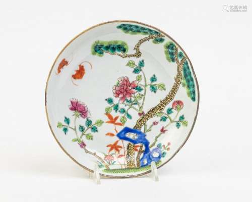 A Chinese polychrome decorated plate, 7 in. (17.78 cm.)