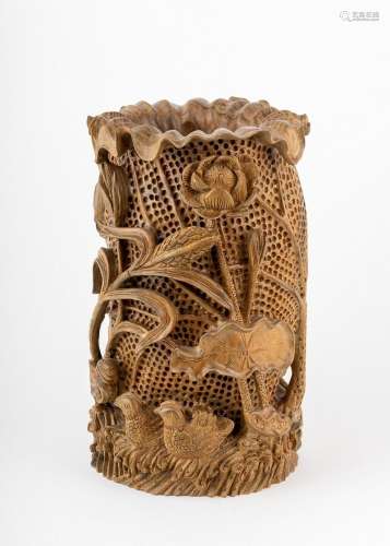 A carved wood vase,