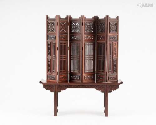 A Chinese six fold wooden table screen