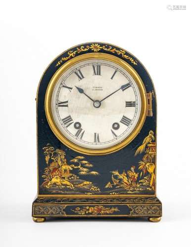 A domed chinoiserie decorated black cased mantel clock, 9 1/...