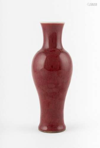 An Chinese iron red glazed scholar plum vase, 9 1/2 x 2 3/8 ...