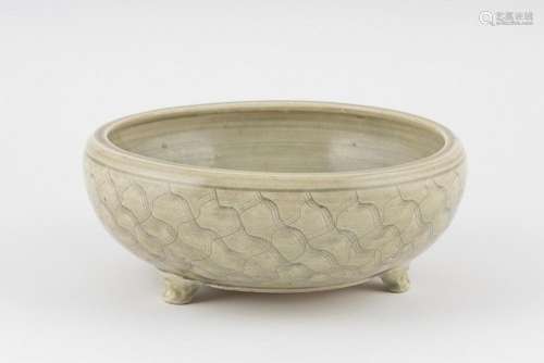 A Chinese bowl raised upon three stub feet, 11 in. (27.94 cm...