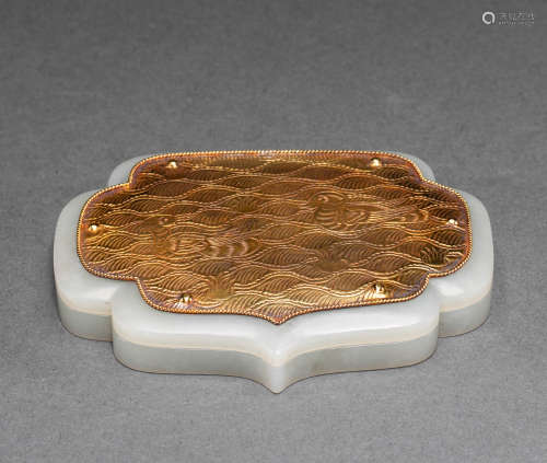 China's Qing Dynasty Hetian jade covered gold compact