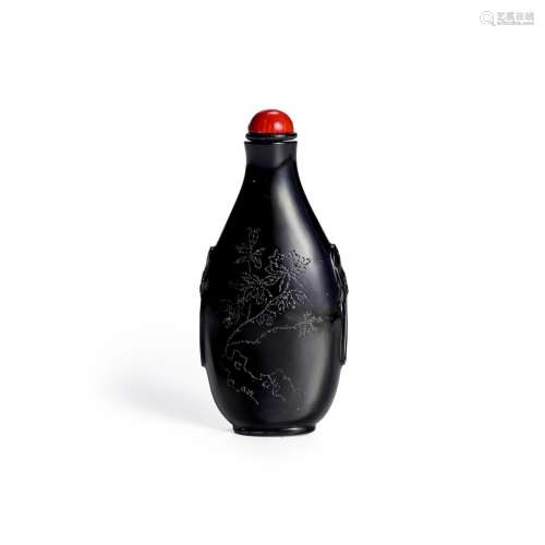 AN ENGRAVED BLACK GLASS SNUFF BOTTLE Qing dynasty, 19th cent...