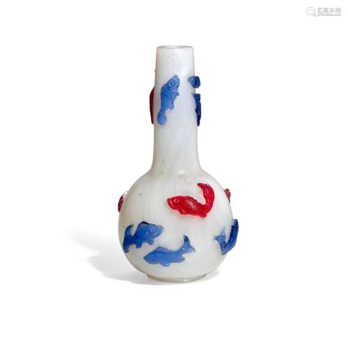 A TRANSPARENT BLUE AND RED OVERLAY SEMI-OPAQUE WHITE GLASS B...