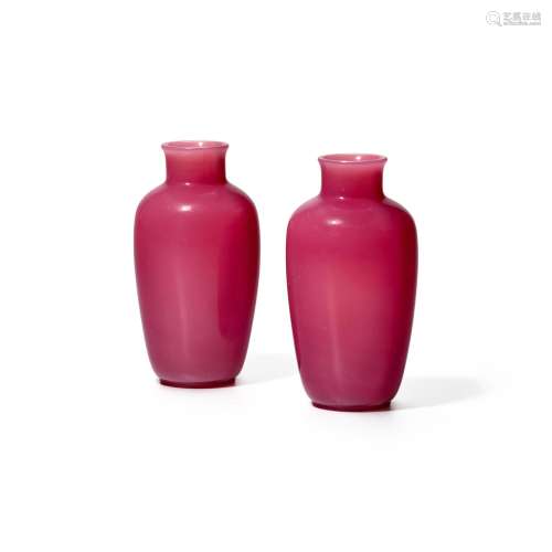 A PAIR OF SEMI-TRANSPARENT PINK GLASS OVIFROM VASES  Qing dy...
