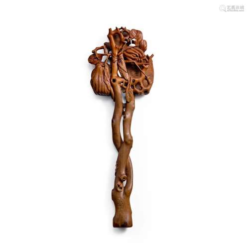 A RARE CARVED BOXWOOD FAN HANDLE