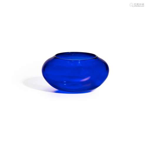 AN ELEGANT TRANSPARENT DEEP BLUE GLASS COMPRESSED-FORM JARLE...