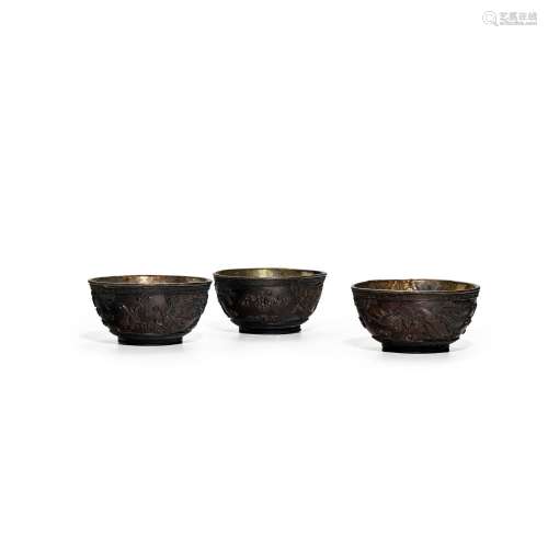 A SET OF TEN CARVED COCONUT CUPS Qing dynasty, 19th century