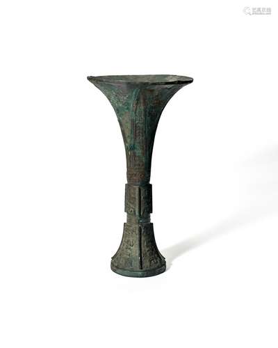 AN ARCHAIC BRONZE RITUAL WINE VESSEL (GU) Shang dynasty, 12t...