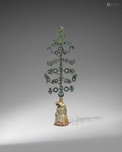 A LARGE BRONZE 'MONEY TREE' WITH GREEN-GLAZED RED PO...