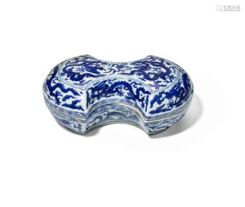 A RARE BLUE-AND-WHITE INGOT-SHAPED 'DRAGON' BOX AND ...