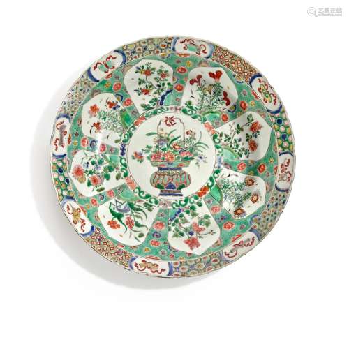 A FAMILLE-VERTE PORCELAIN 'FLOWER BASKET' CHARGER Ka...