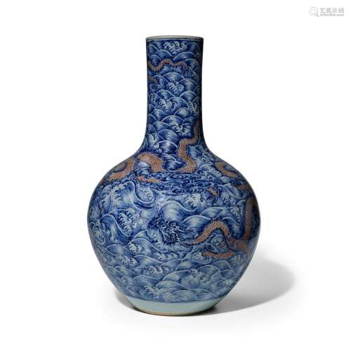 A LARGE BLUE-AND-WHITE AND UNDERGLAZE-RED DRAGON VASE, TIANQ...