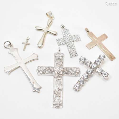 GROUP OF SILVER CRUCIFIX PENDANTS