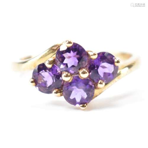 HALLMARKED 9CT GOLD & PURPLE STONE CROSSOVER RING