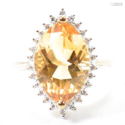 HALLMARKED 9CT GOLD DIAMOND & YELLOW STONE HALO RING