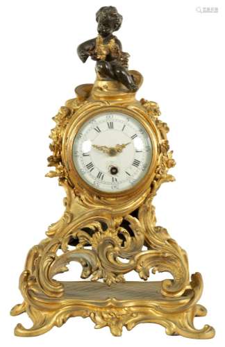 A LATE 19TH CENTURY FRENCH ROCOCO STYLE ORMOLU MANTEL CLOCK