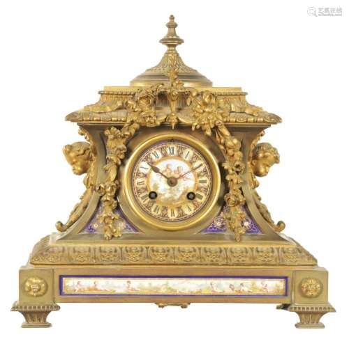 A 19TH CENTURY FRENCH PORCELAIN PANELLED ORNATE CAST BRASS M...