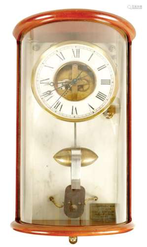 PAUL MORET, 1933. A BOULLE STYLE ELECTRIC WALL CLOCK