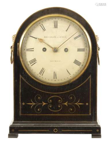 BROCKBANK & ATKINS, LONDON. A REGENCY EBONISED AND BRASS...