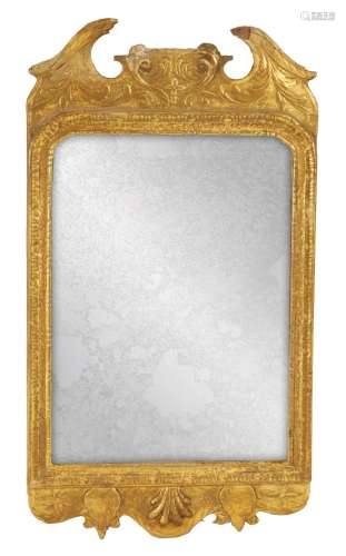 A GEORGE II CARVED GILT WOOD MIRROR OF SMALL PROPORTIONS