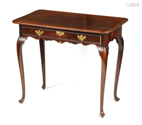 AN EARLY 18TH CENTURY FIGURED MAHOGANY SIDE TABLE