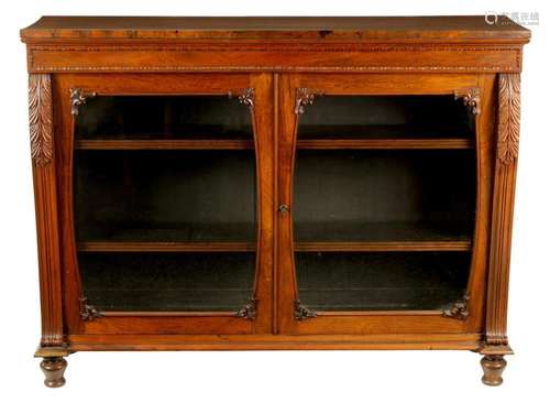 A WILLIAM IV FIGURED ROSEWOOD GLAZED BOOKCASE IN THE MANNER ...