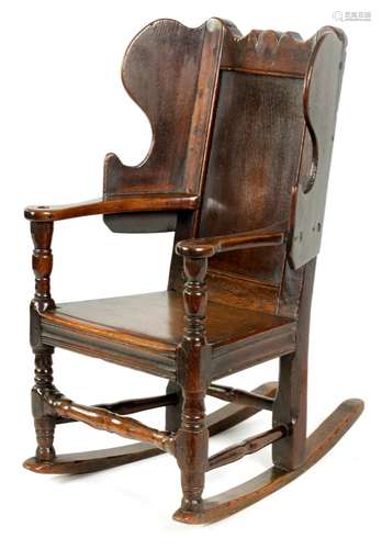 A RARE EARLY 18TH CENTURY JOINED OAK CHILD S LAMBING CHAIR