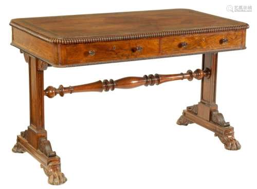 A FINE LATE REGENCY FIGURED ROSEWOOD LIBRARY TABLE IN THE MA...