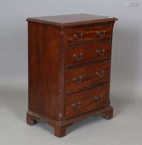 A 20th century George III style mahogany narrow chest of fou...