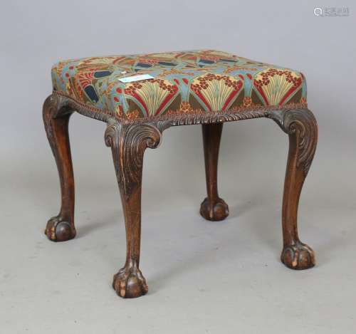 An early 20th century George III style mahogany stool with c...