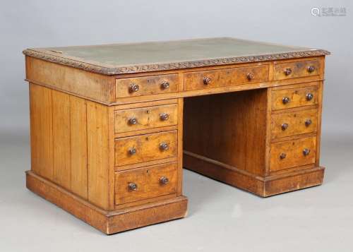 A mid-Victorian pollard oak twin pedestal desk
