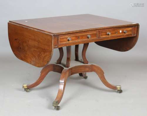 A 19th century mahogany sofa table with boxwood inlay