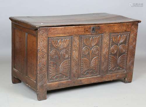 A late 17th century oak coffer with hinged lid